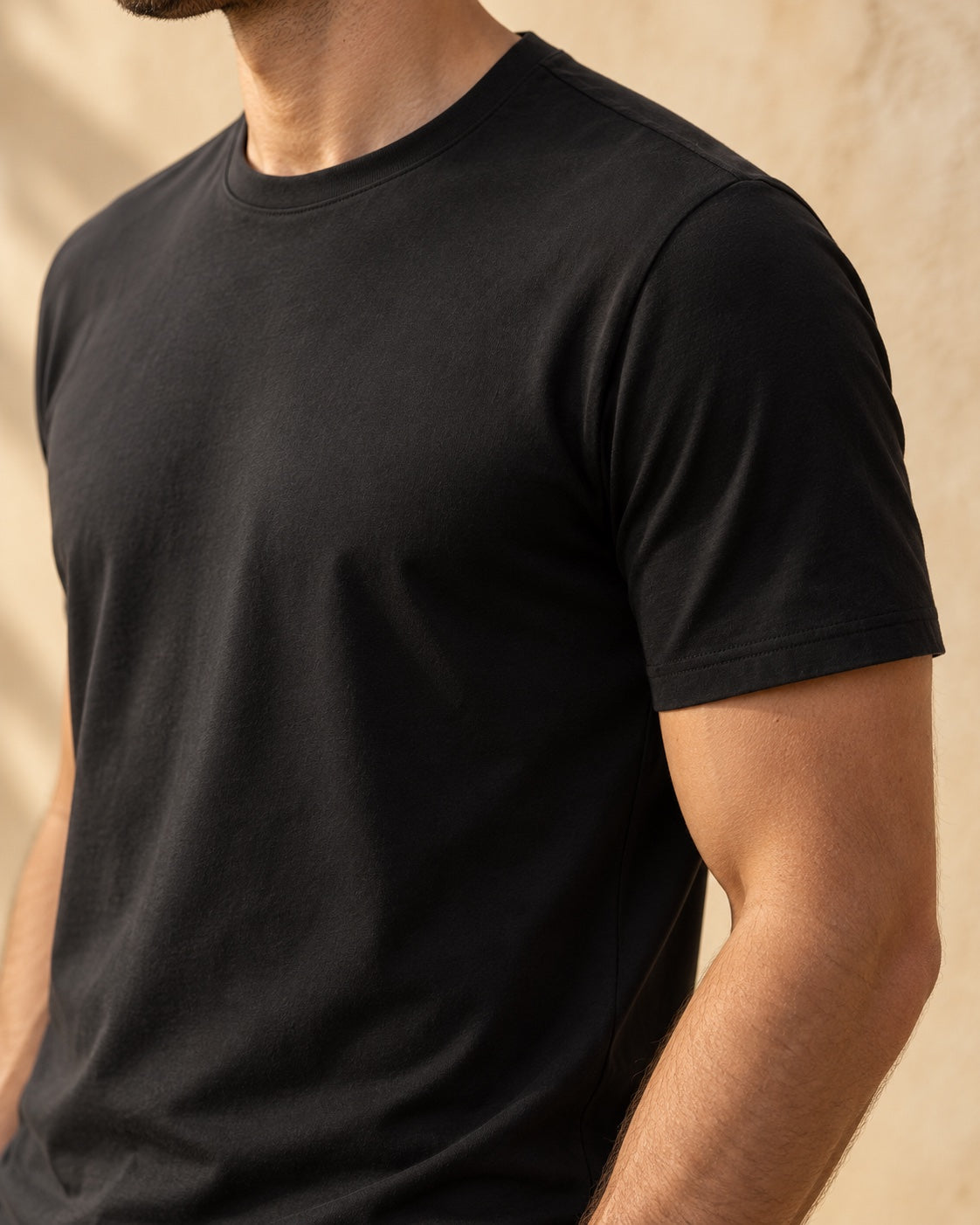 Close-up of the Iconic shoulder seam and fitted short sleeve.